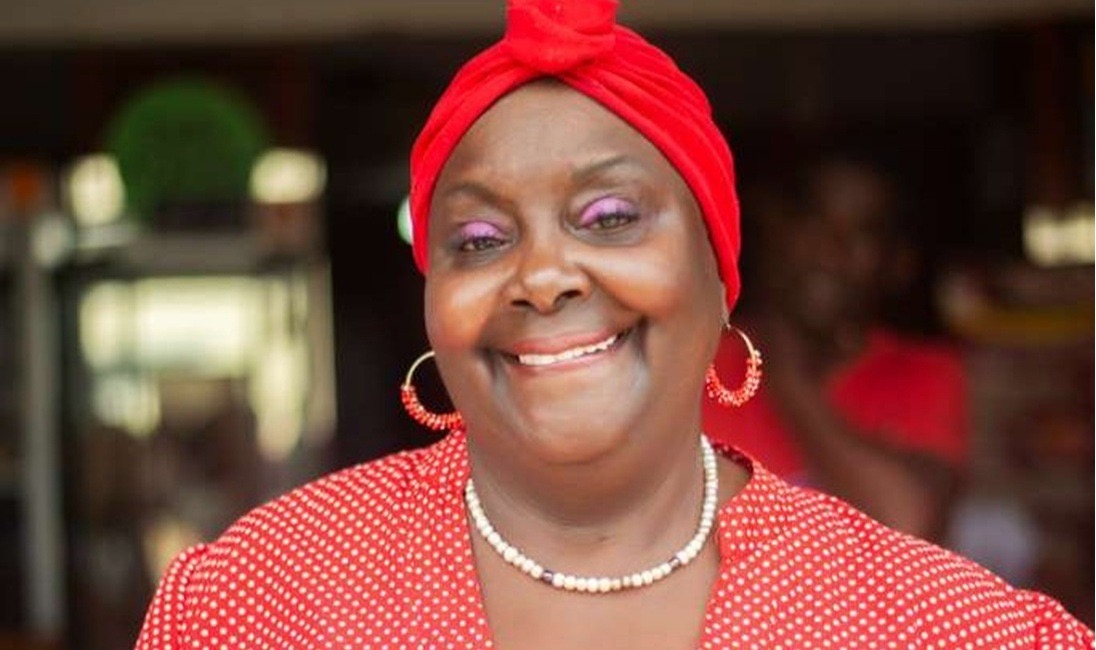 A dark, atmospheric shot of Machu Picchu on a foggy day.